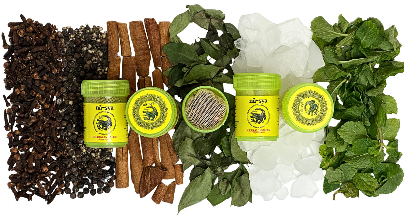 Tea leaves, tea packaging, and cinnamon sticks and herbal inhalers arranged in a decorative pattern on a white background.